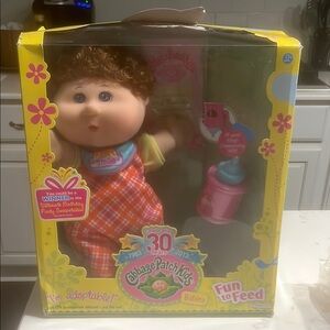 Red and Blue Doll with Accessories